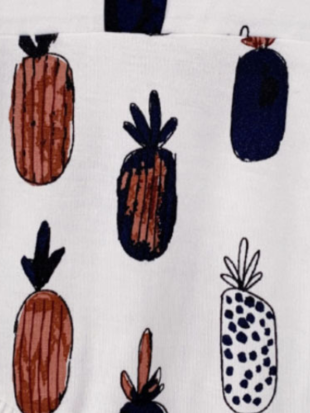 Pattern of colorful illustrated pineapples on a white background.