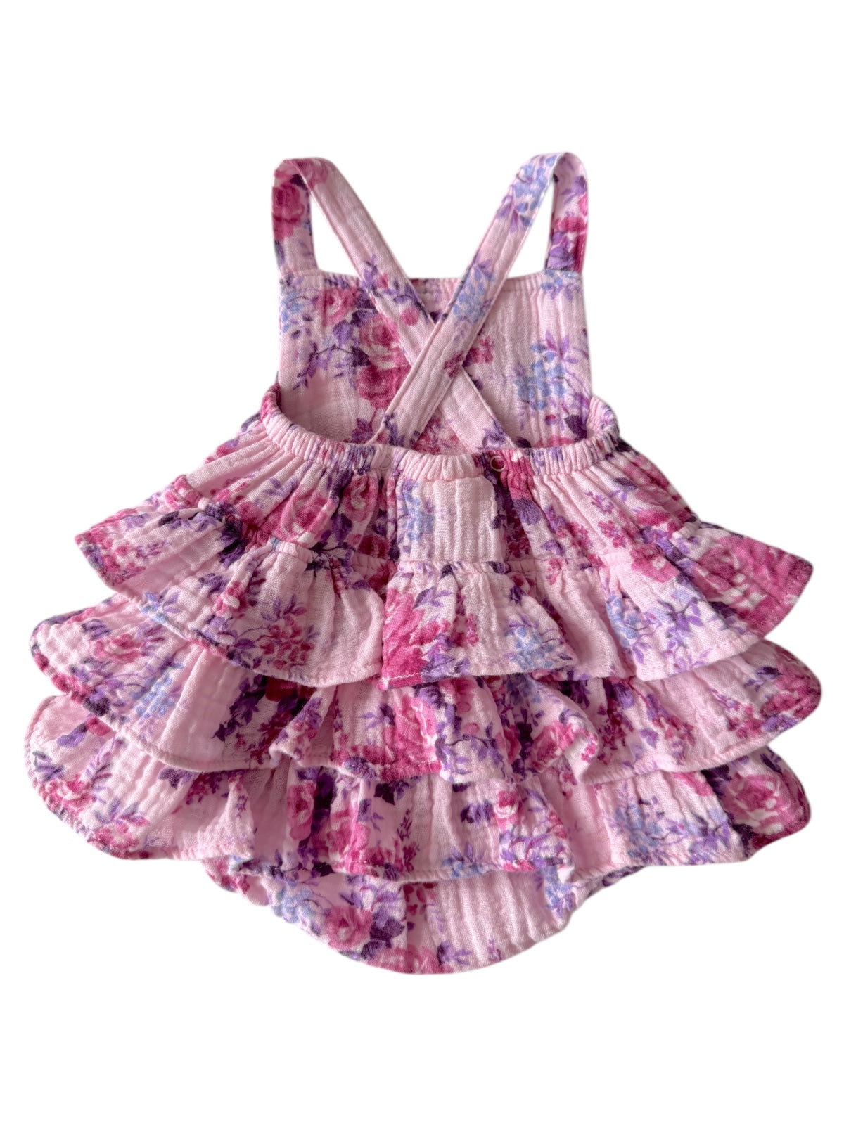 Floral-patterned toddler dress with layered ruffles in shades of pink and purple. Perfect for spring or summer.