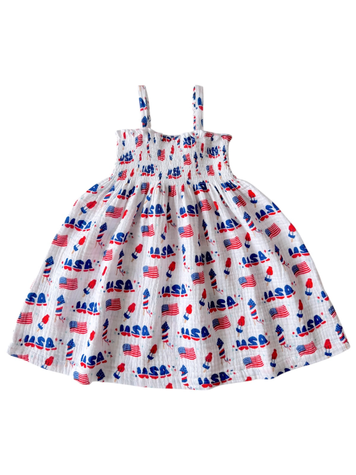 Child's dress with straps featuring a pattern of "NASA" text and American flags in red, white, and blue colors.