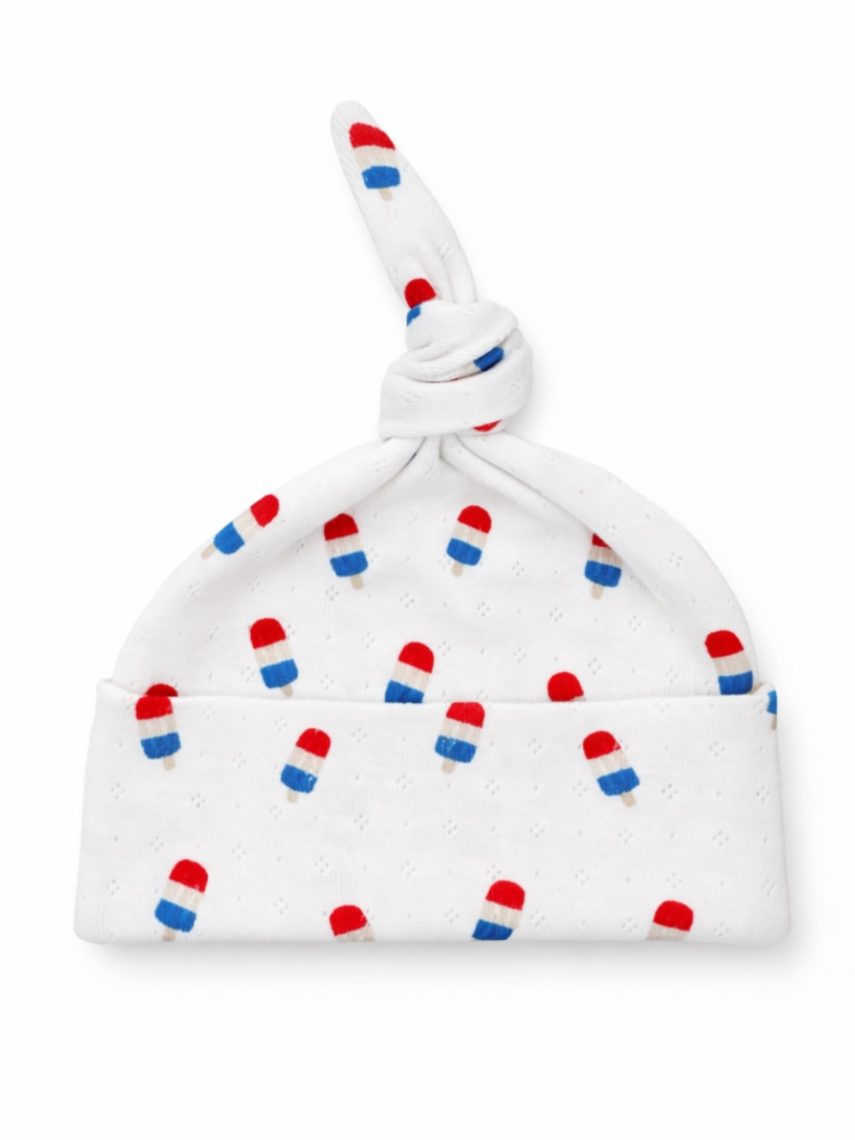 White baby hat with colorful popsicle pattern and a knotted top.