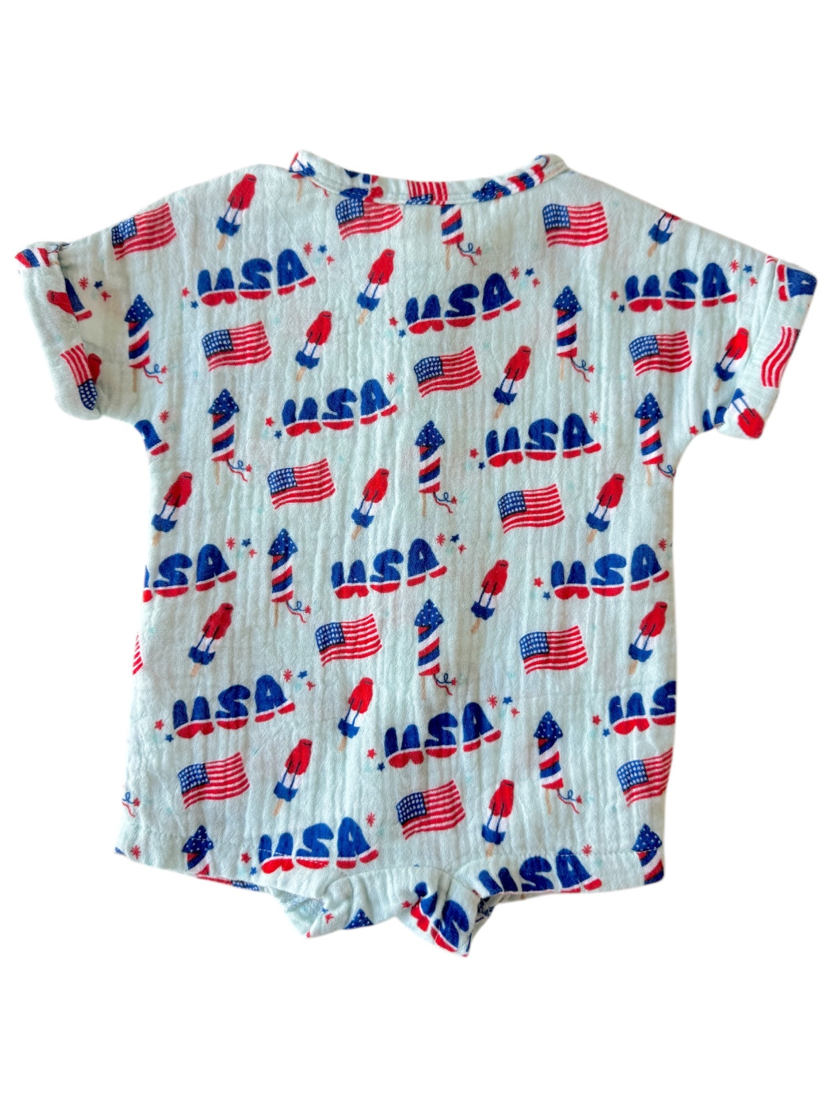 Children's short-sleeve onesie featuring a fun print of rockets and American flags, primarily in red, white, and blue.
