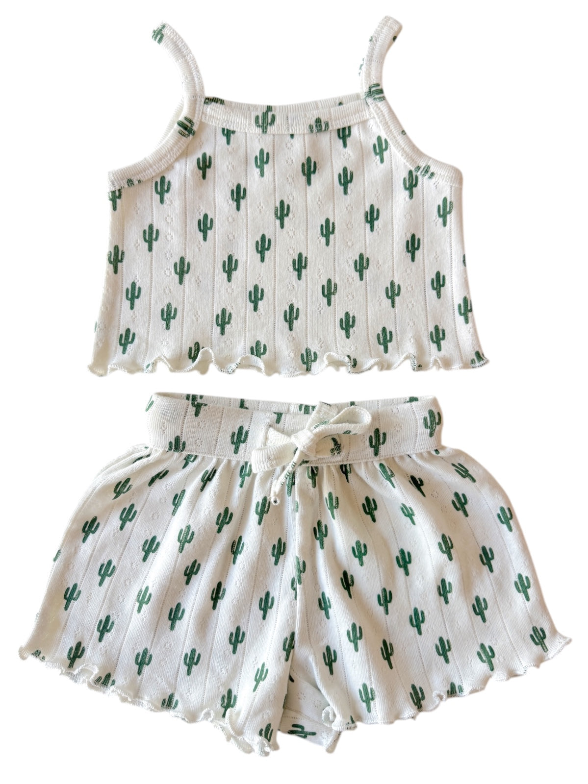 Cactus-patterned kids' two-piece pajama set featuring a spaghetti strap top and matching shorts.