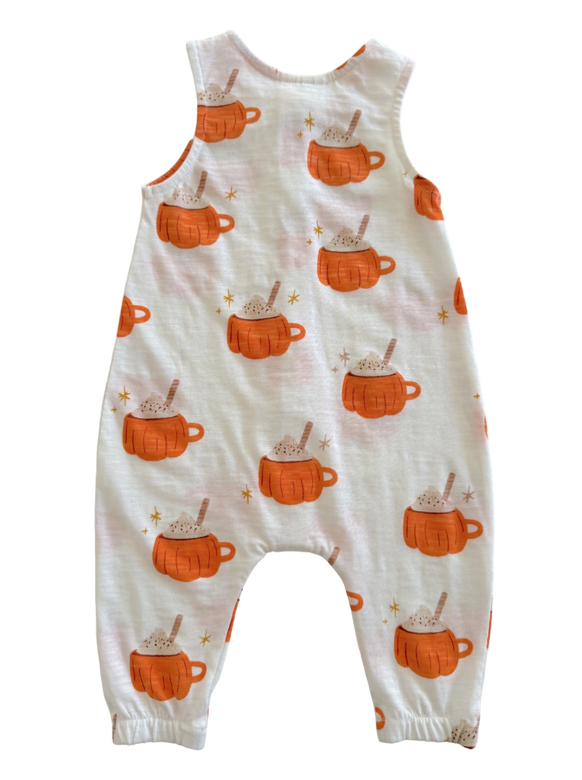 Toddler romper with orange mugs and whipped cream pattern on a light background. Perfect for fall fashion.
