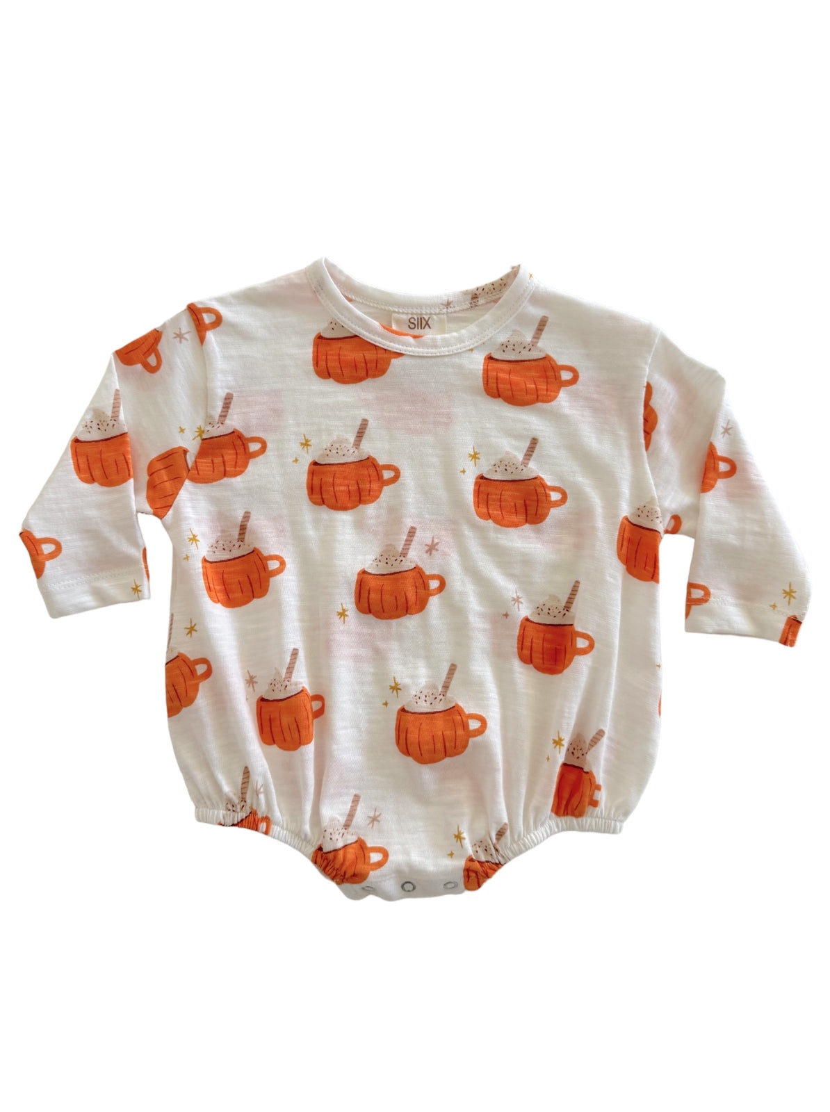 White onesie with orange mugs and sparkles print, featuring a round neckline and long sleeves.