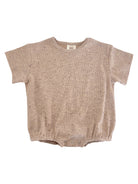 Light brown short-sleeve infant romper with textured fabric and snap closure at the bottom.
