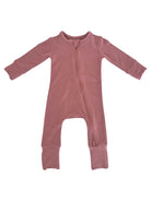 Pink infant onesie with long sleeves and a front zipper, featuring a speckled design.