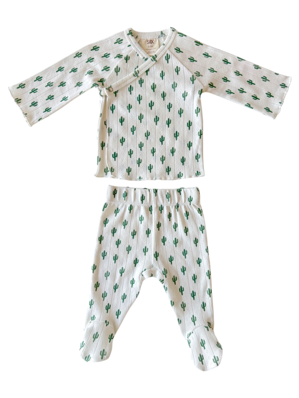 Green cactus patterned baby outfit featuring a long-sleeve top and matching pants on a white background.
