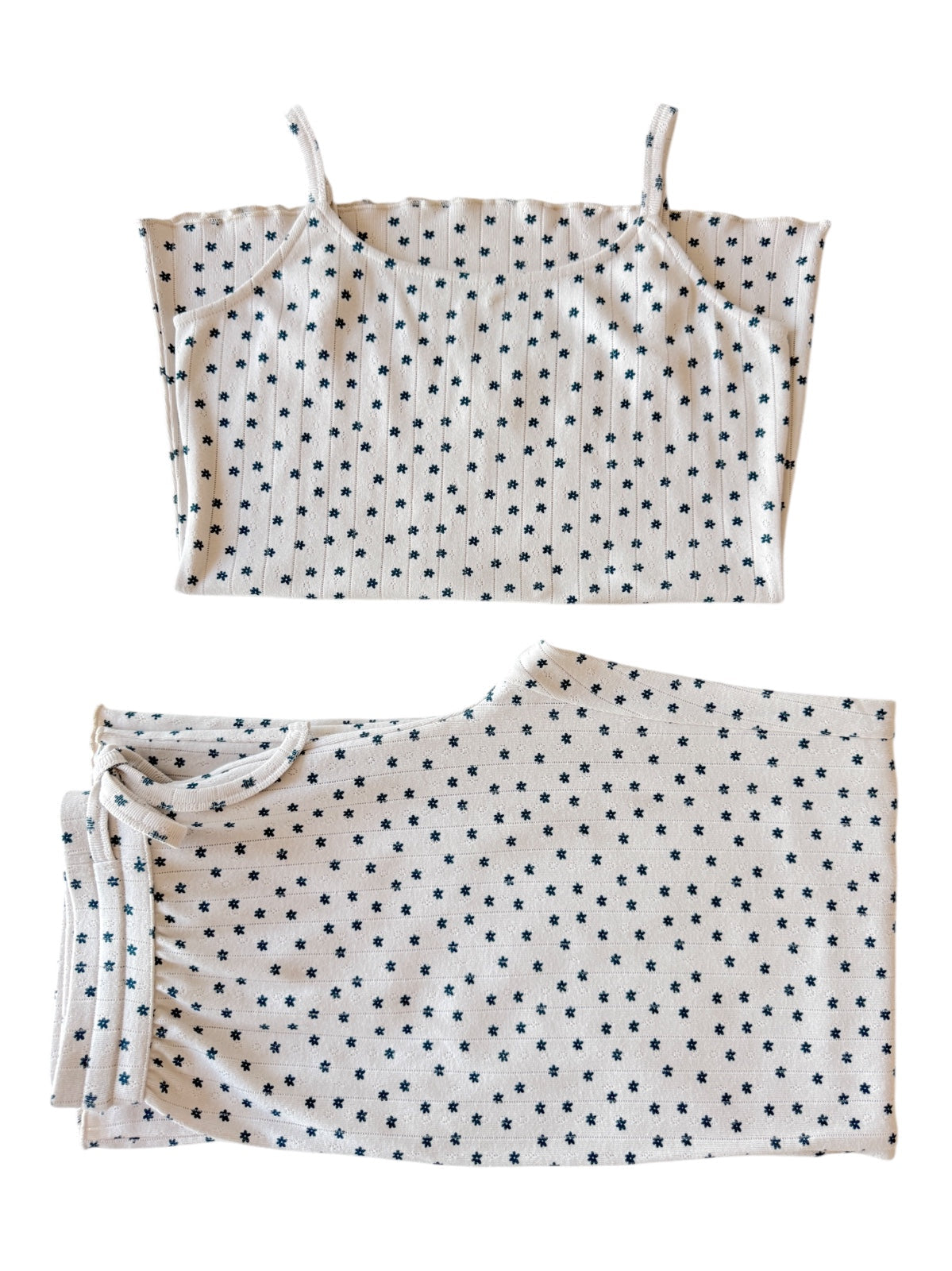 Cotton sleep set featuring a sleeveless top and matching shorts, both with a star pattern on a cream background.