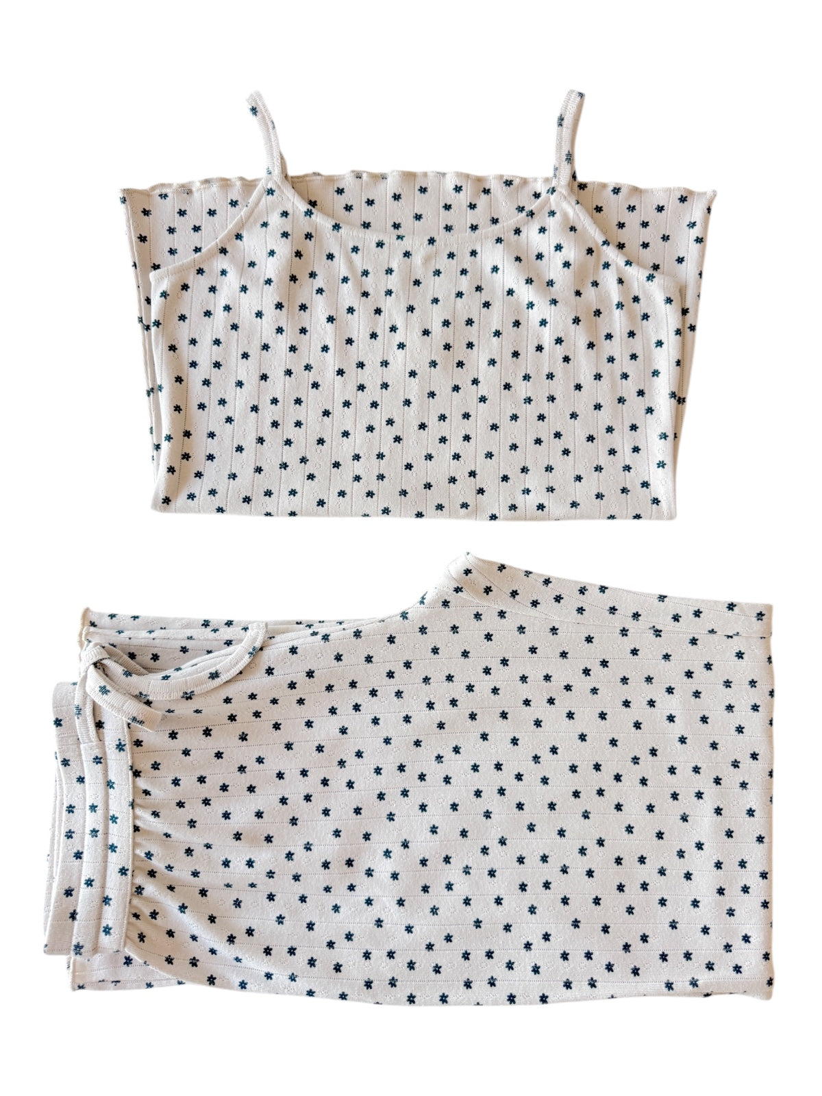 Cotton sleep set featuring a sleeveless top and matching shorts, both with a star pattern on a cream background.