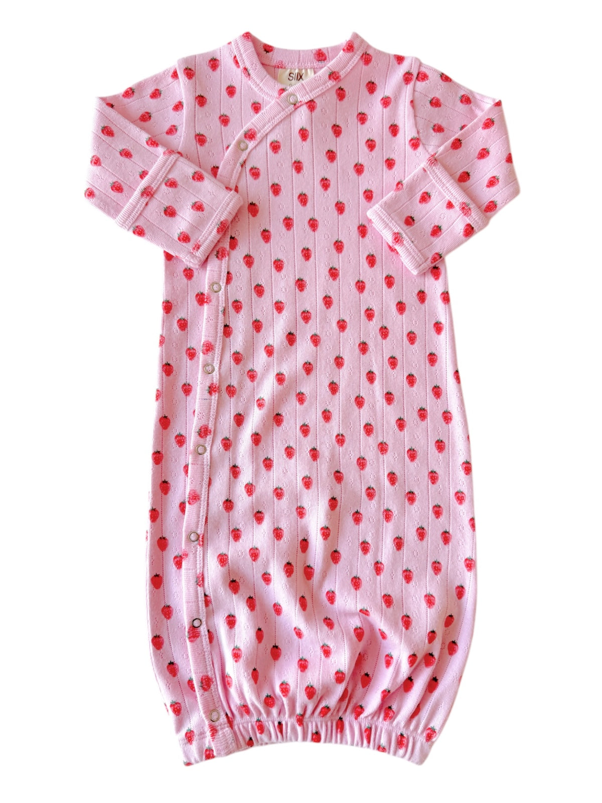 Pink baby gown with red strawberry prints and buttons, featuring long sleeves and gathered bottom.