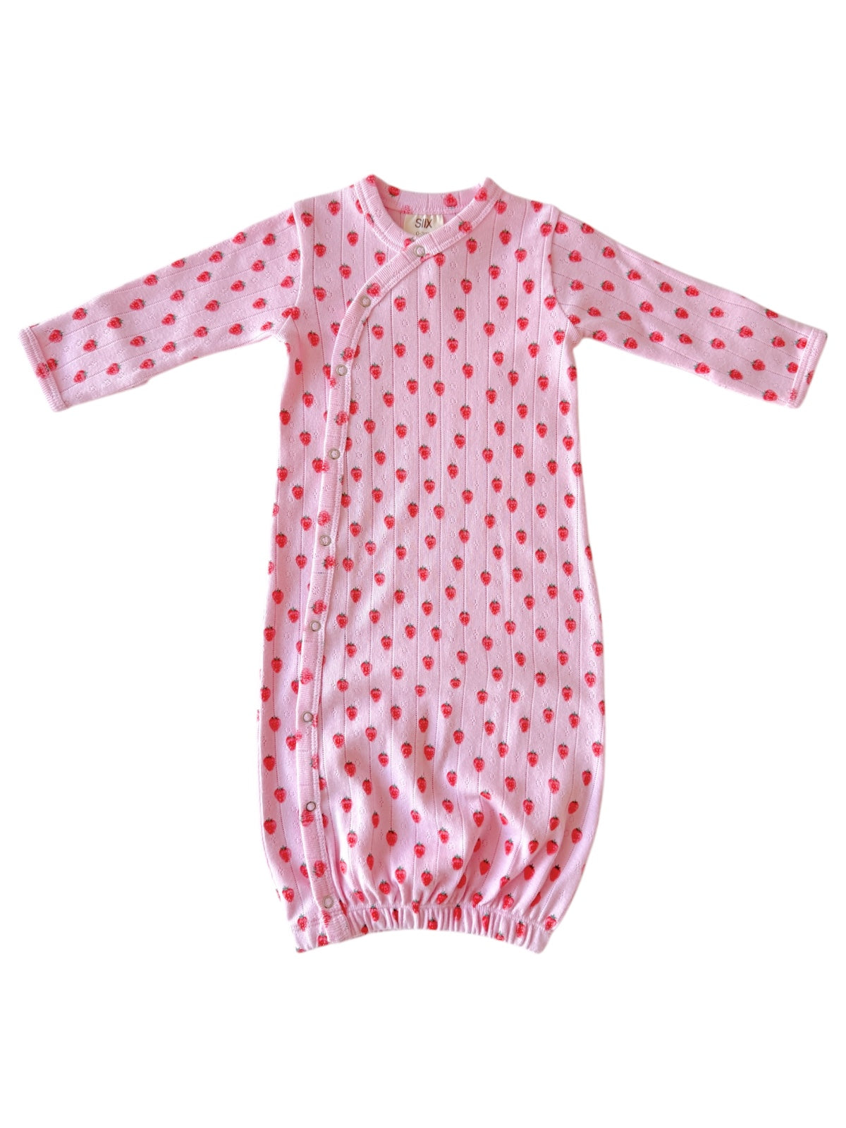 Pink baby gown with red strawberry patterns and elasticized bottom for comfort.