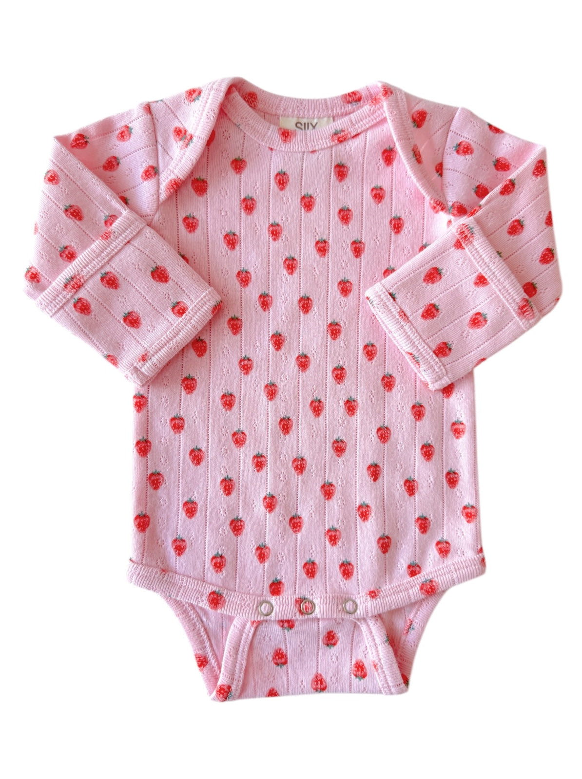 Light pink baby onesie adorned with red strawberries, featuring long sleeves and snap closures at the bottom.