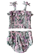 Floral kids' two-piece set featuring a ruffled crop top and matching bloomers in pink and green hues.