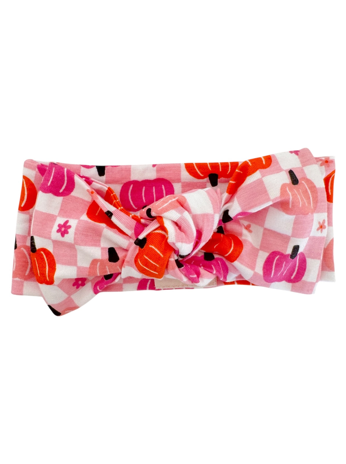Pink checkered headband featuring colorful pumpkin prints and a knot detail in the center.