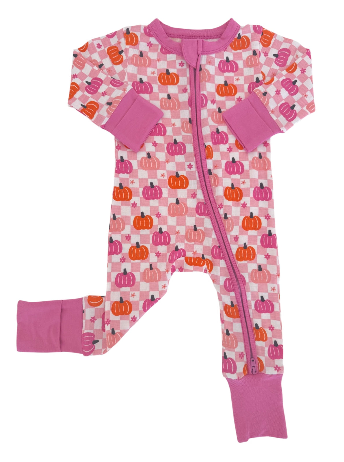 Pink pajama onesie with pumpkin patterns and purple cuffs, featuring a full front zipper.