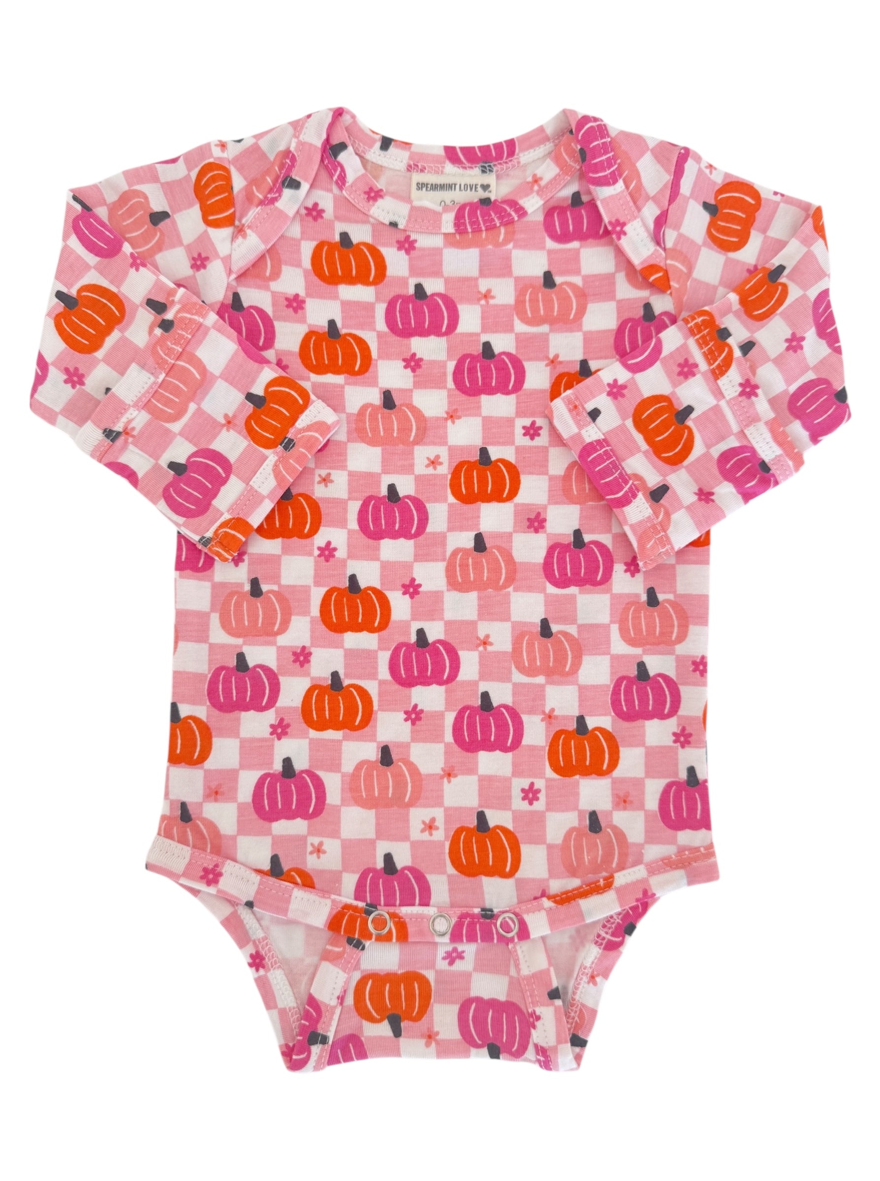 Long-sleeve baby onesie with colorful pumpkin print on a pink checkered background. Perfect for fall fashion.