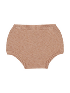 Knit baby bloomers in soft beige with a ribbed waistband and leg openings.