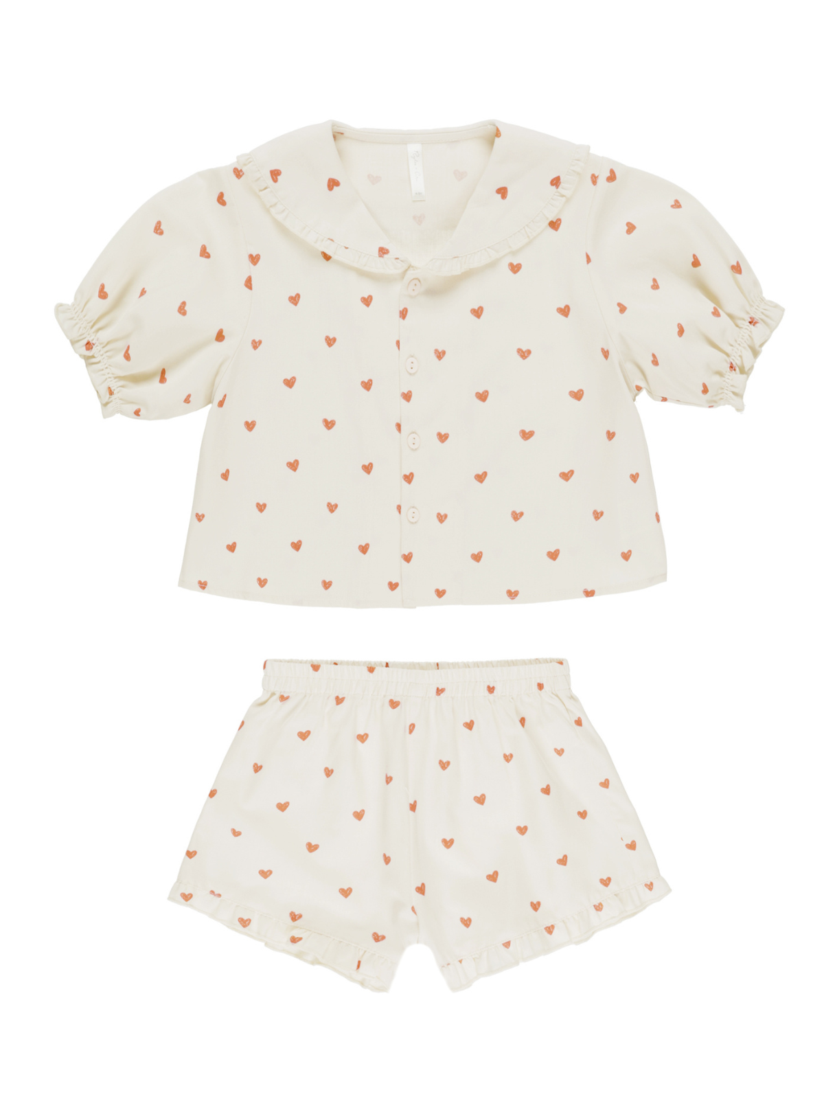 Cream-colored pajama set featuring a collared top and shorts, adorned with small orange hearts.