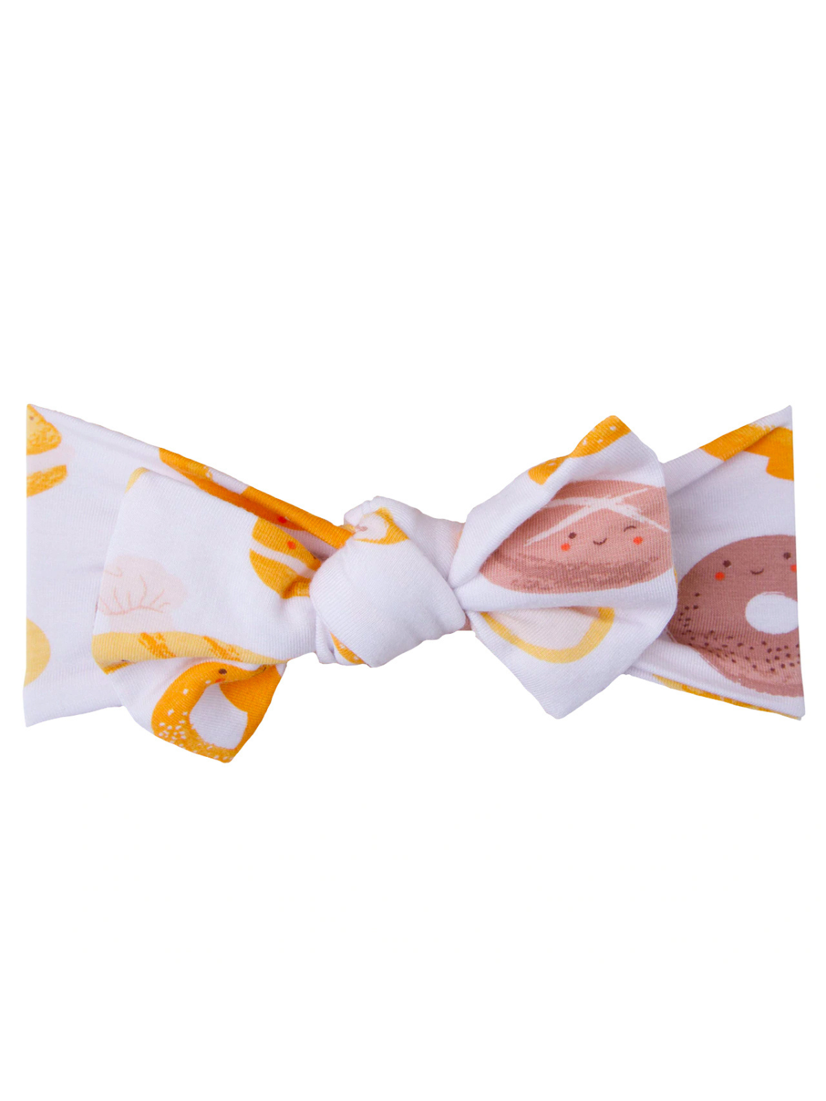 White bow adorned with colorful illustrations of donuts and snacks, perfect for a playful accessory.