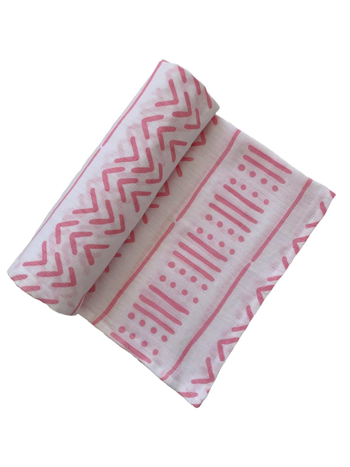 Pink patterned fabric rolled up, featuring zigzag and dot designs on a white background.