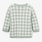 Light green and white checkered sweater, viewed from the back, featuring long sleeves and a rounded neckline.