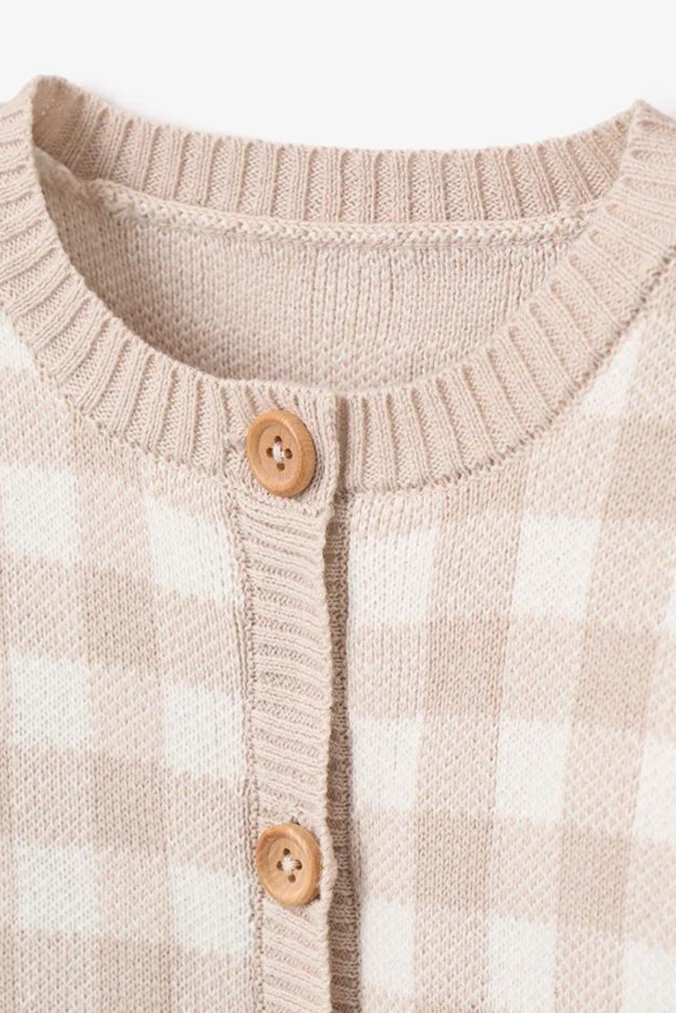 Beige and white checkered cardigan with wooden buttons and ribbed collar detail.