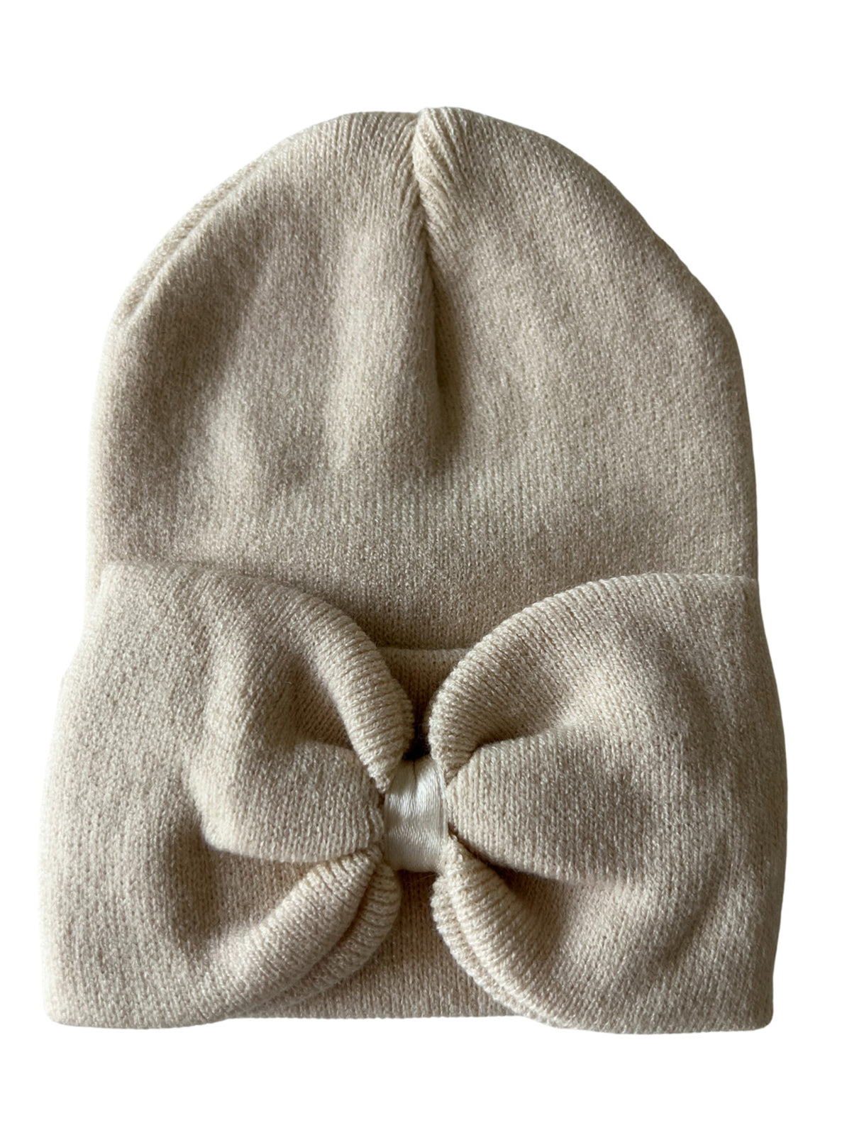 Cream-colored knit beanie with a bow detail at the front.