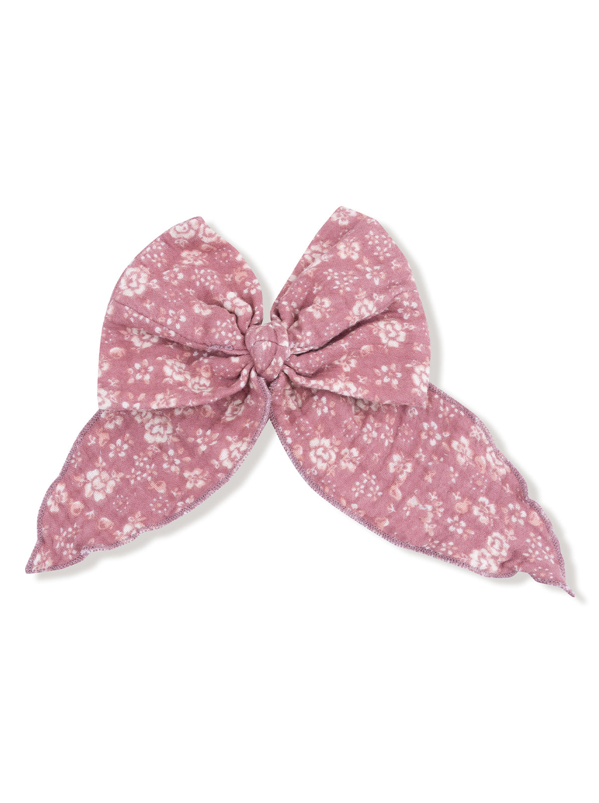 Pink floral fabric hair bow with two elongated loops, tied in the center.