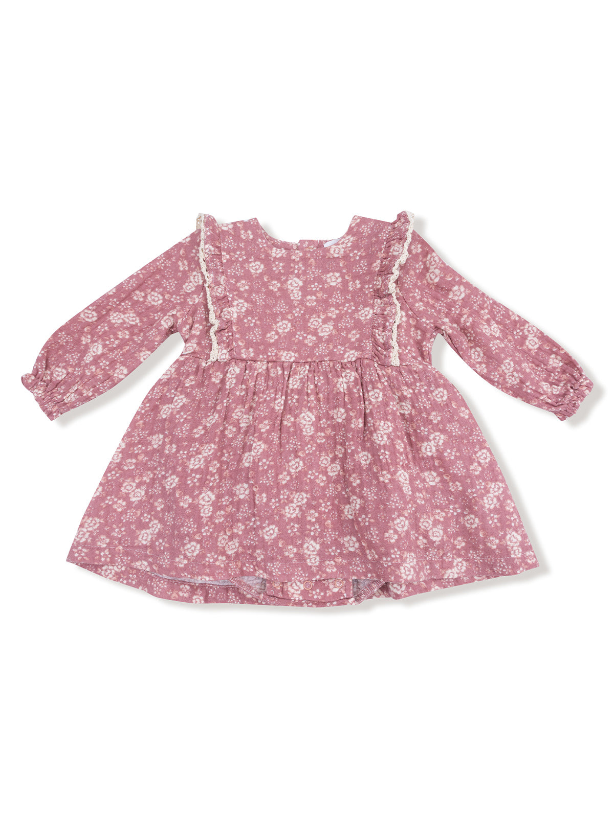 Long-sleeve pink floral dress with lace trim and a gathered skirt. Perfect for casual or special occasions.
