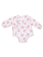 Pink floral baby onesie with long sleeves and a wrap design on a white background.