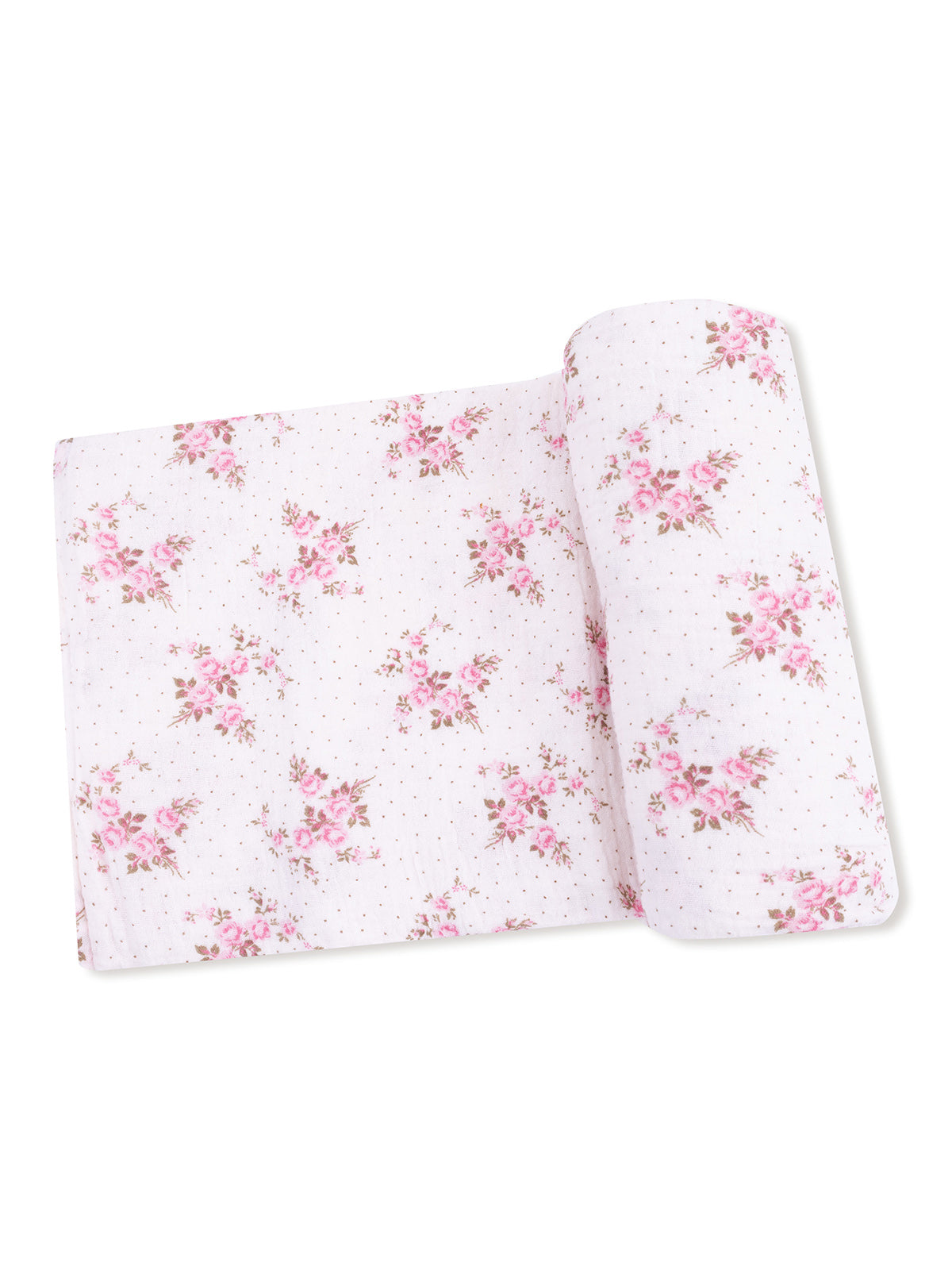 Light pink floral fabric folded with small polka dots, ideal for crafts and home decor.