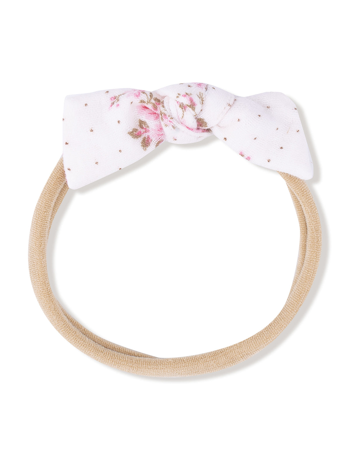 Floral knotted headband on a beige elastic band, stylish accessory for girls and women.
