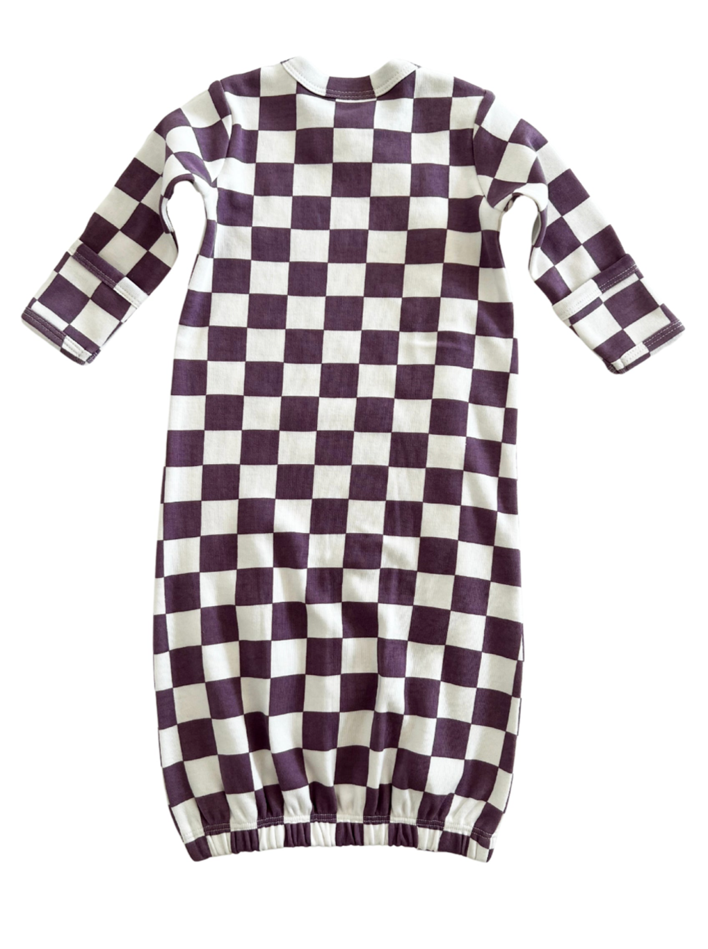Purple and white checkered long-sleeve dress with a gathered hem.