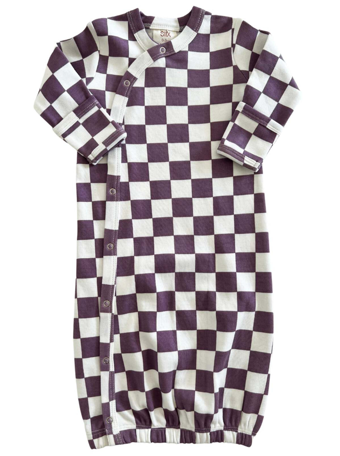 Purple and white checkered baby sleep gown with snap closures and gathered hem. Ideal for comfort and style.
