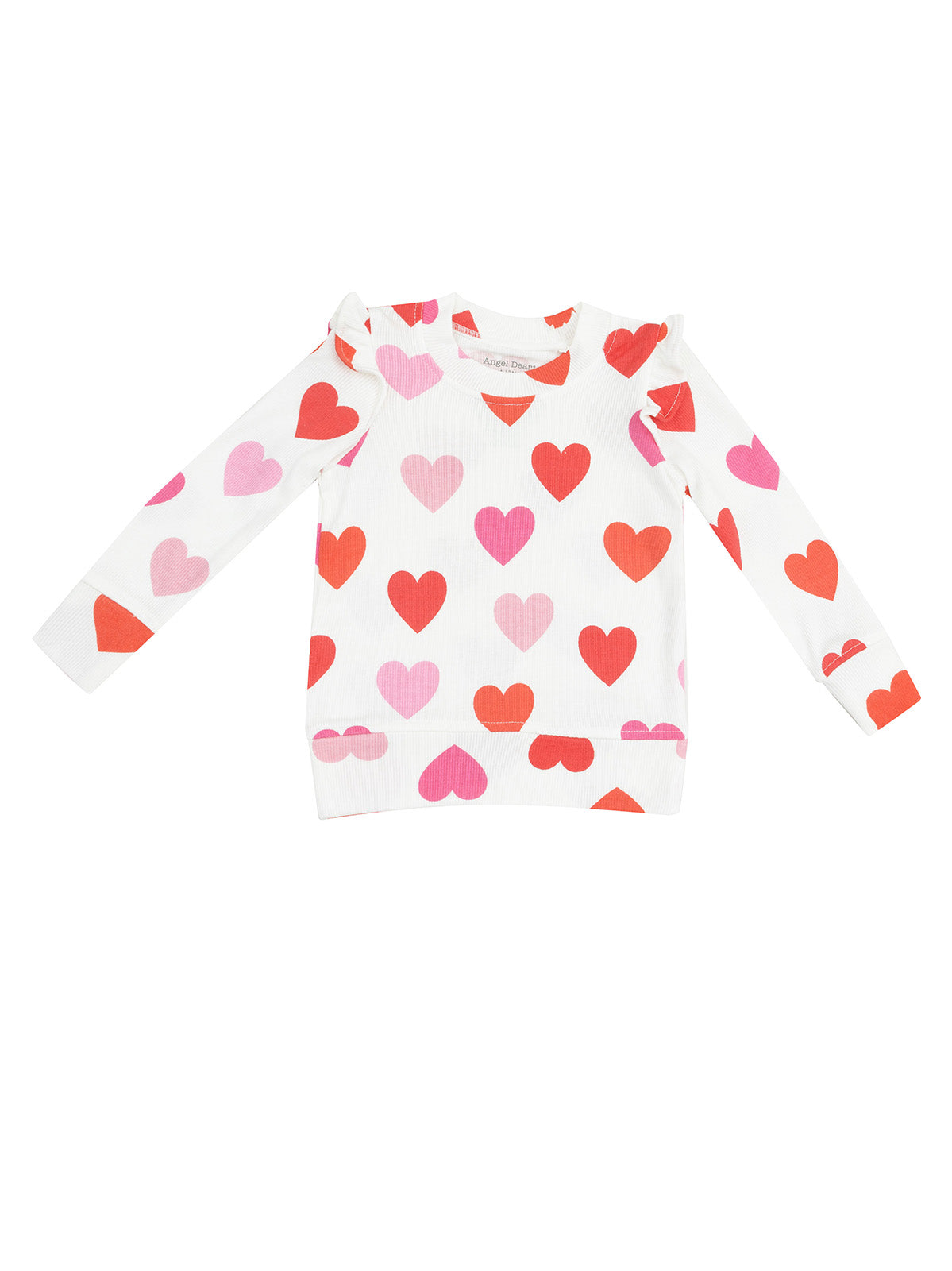 White long-sleeve top with colorful heart patterns in red and pink. Perfect for a playful, casual look.