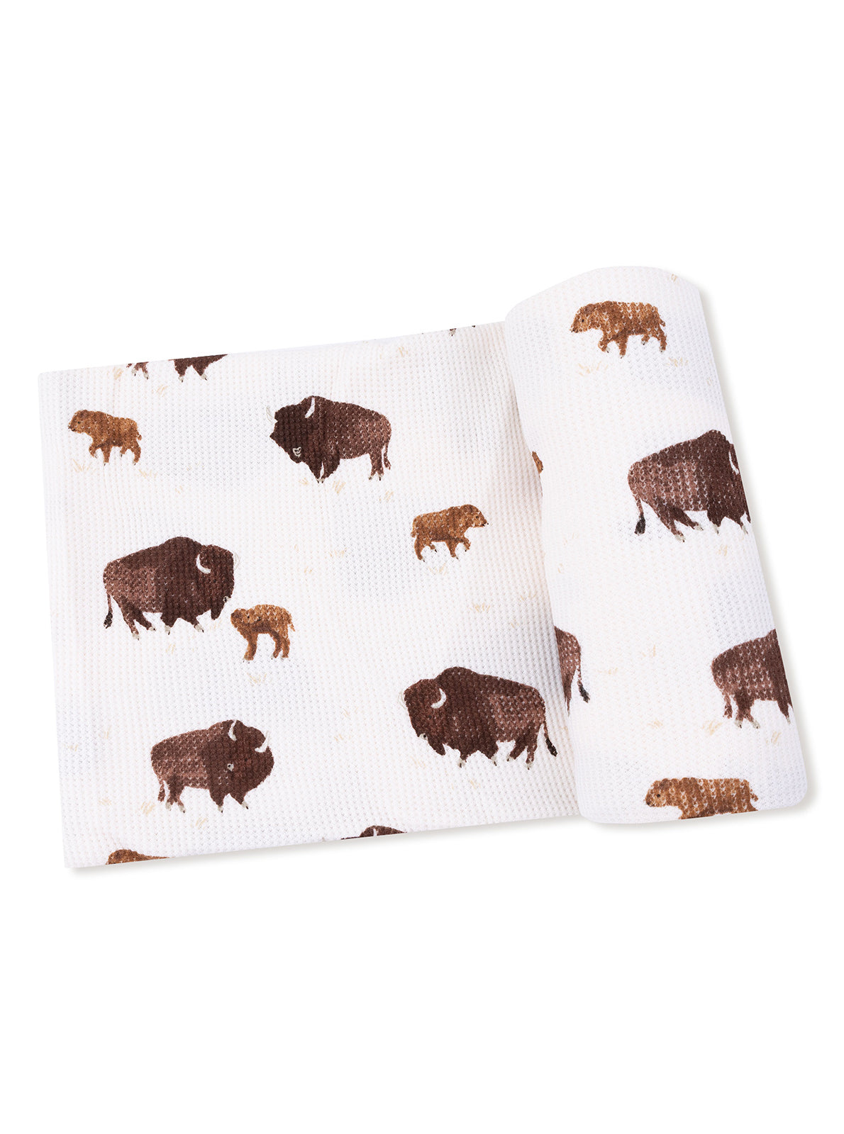 Bison-patterned fabric in brown and tan on a white background, folded for display.