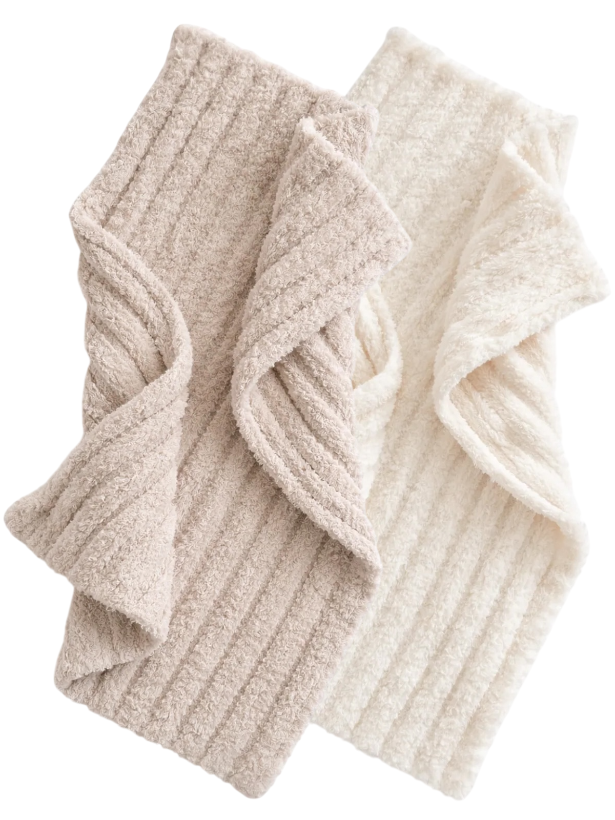 Neutral-colored textured towels folded together, one beige and one white, showcasing their soft, cozy fabric.