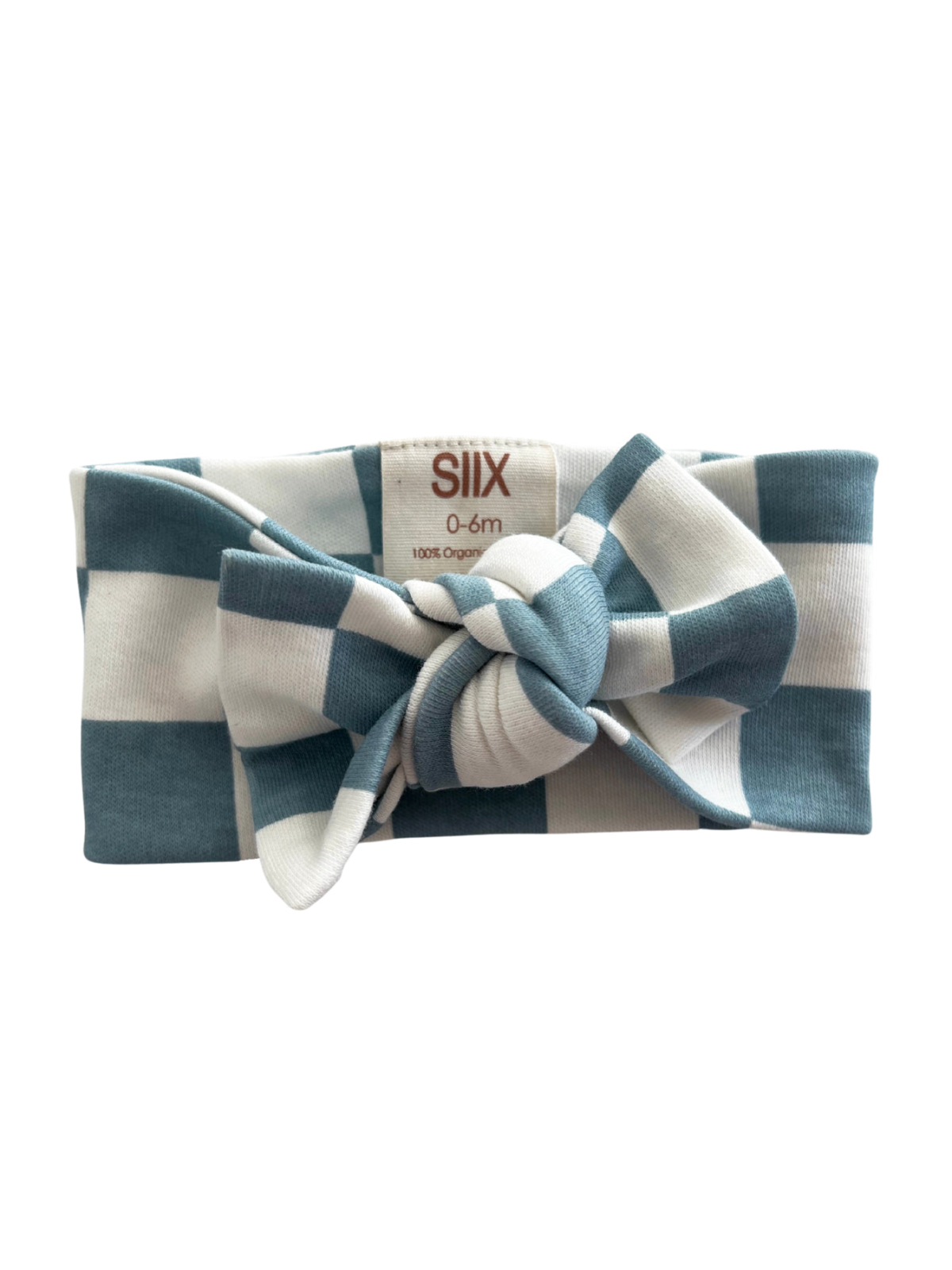 Blue and white checkered infant headband with a knot, labeled for 0-6 months, made of 100% organic cotton.