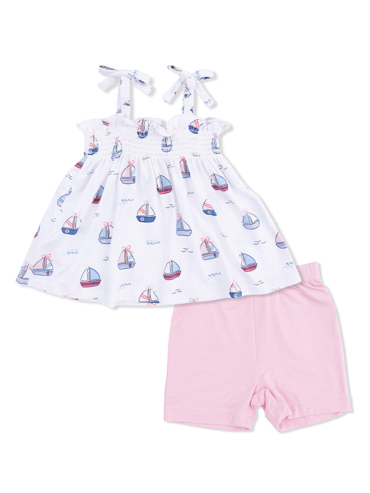 Toddler outfit featuring a sleeveless sailboat print top and pink shorts. Perfect for warm weather!