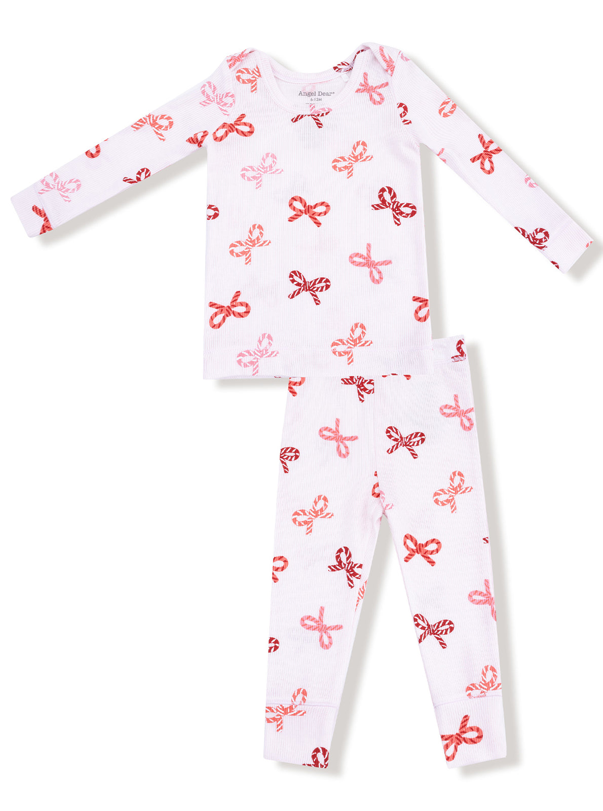 White pajama set featuring red and pink bow patterns, including a long-sleeve top and matching pants.