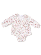 Floral-patterned baby onesie with long sleeves and wrap design in soft colors on a white background.