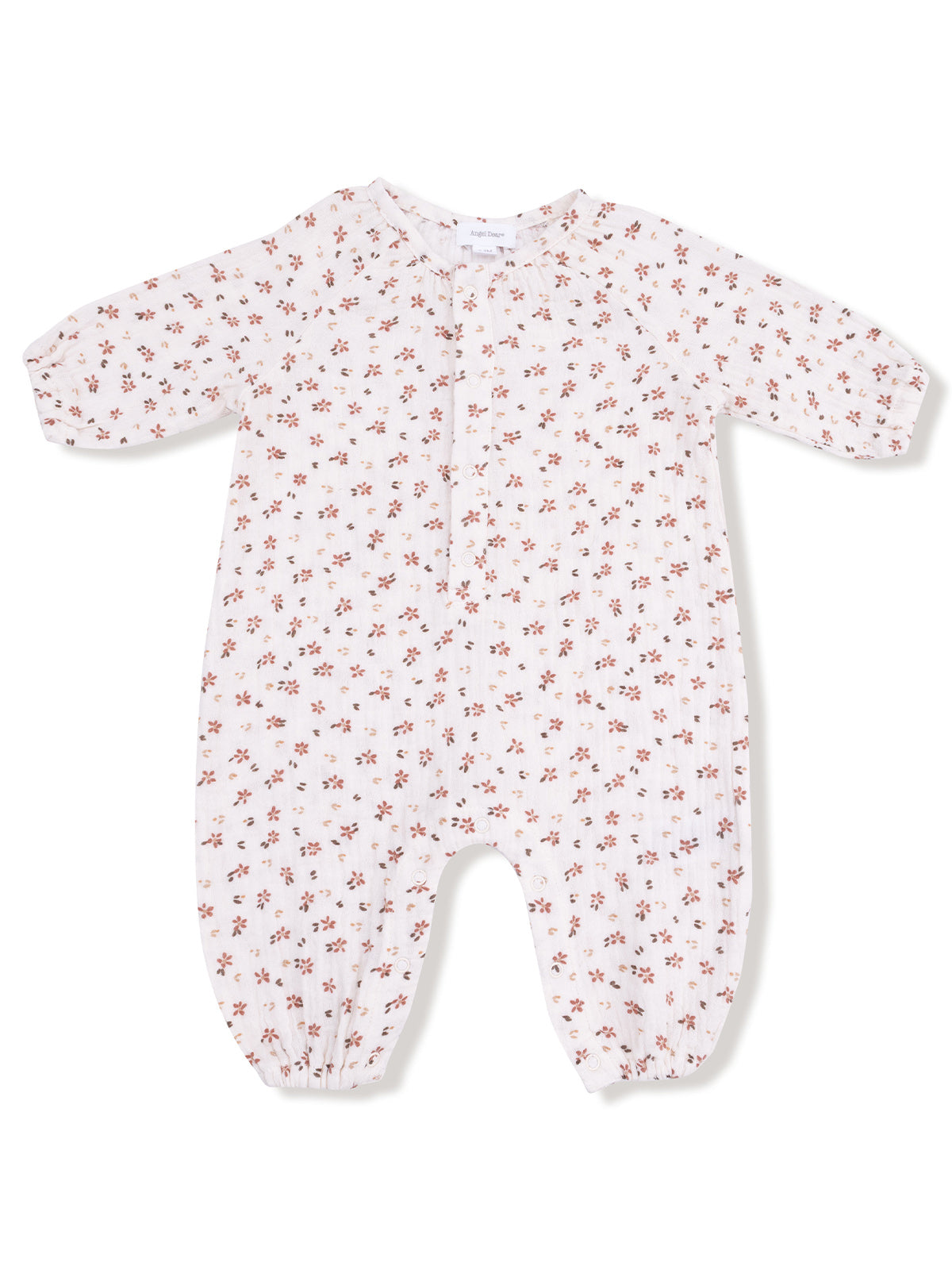 White baby romper with a floral pattern, featuring long sleeves and elasticized cuffs.
