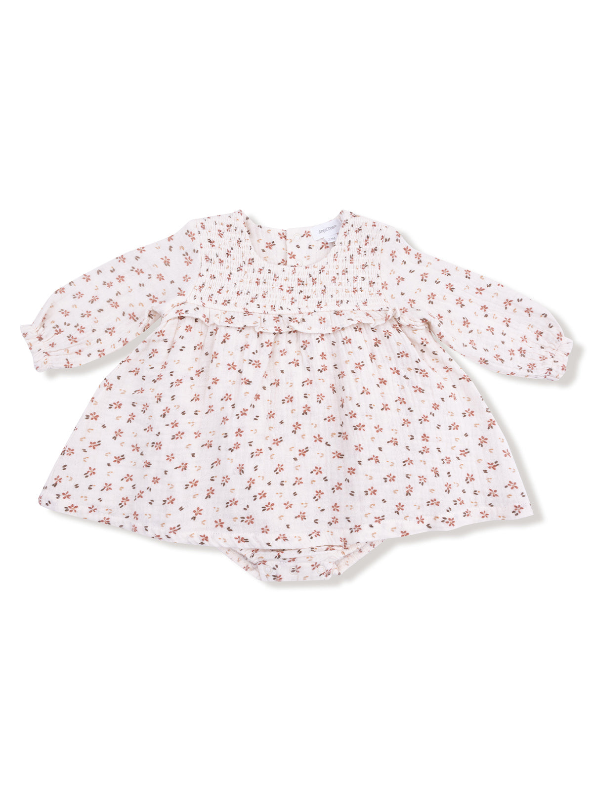 White baby dress with floral pattern and long sleeves, featuring a smocked bodice and ruffled hem.