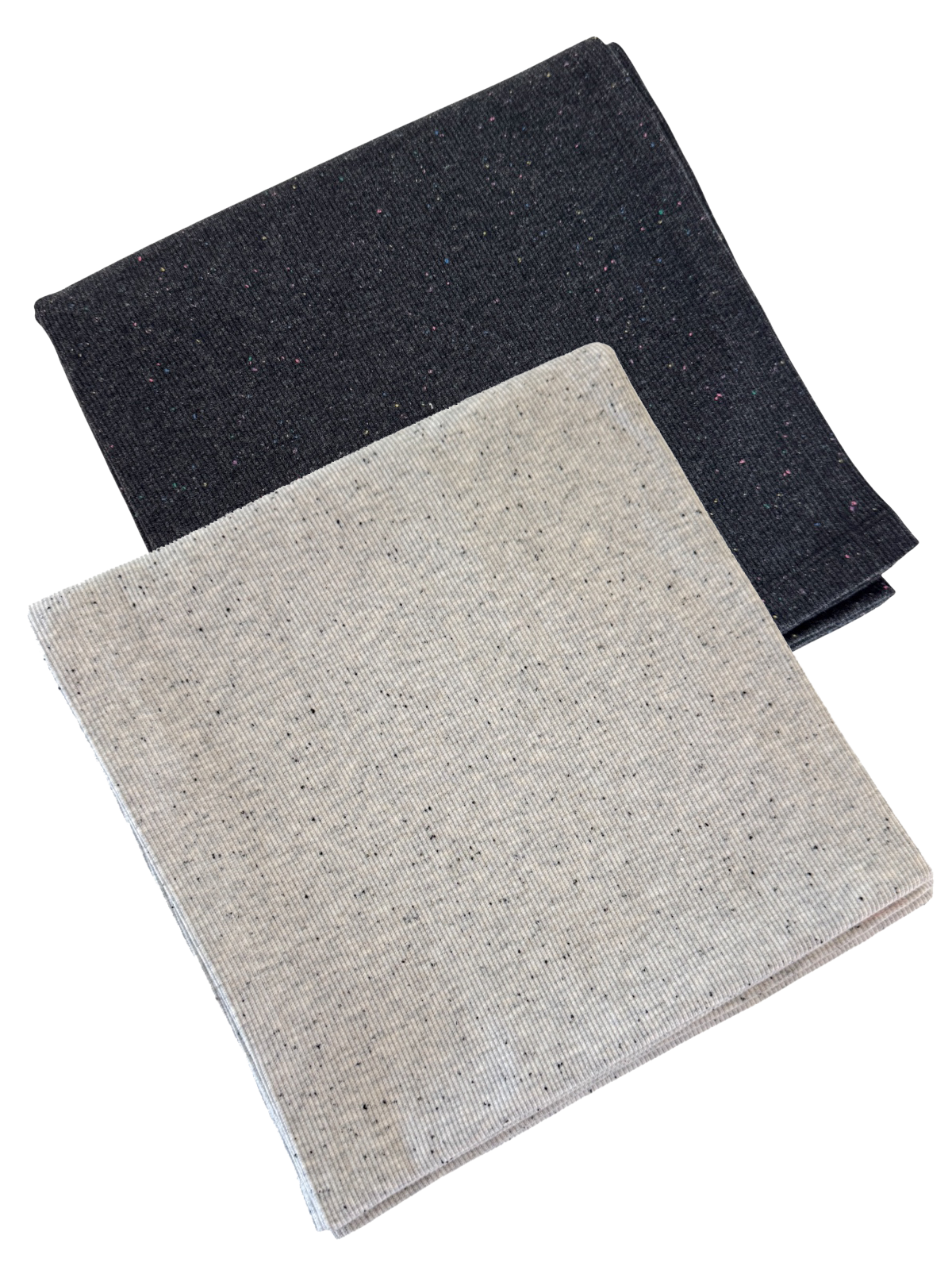 Two folded fabric swatches, one dark gray with speckles and one light beige with speckles, arranged overlapping.