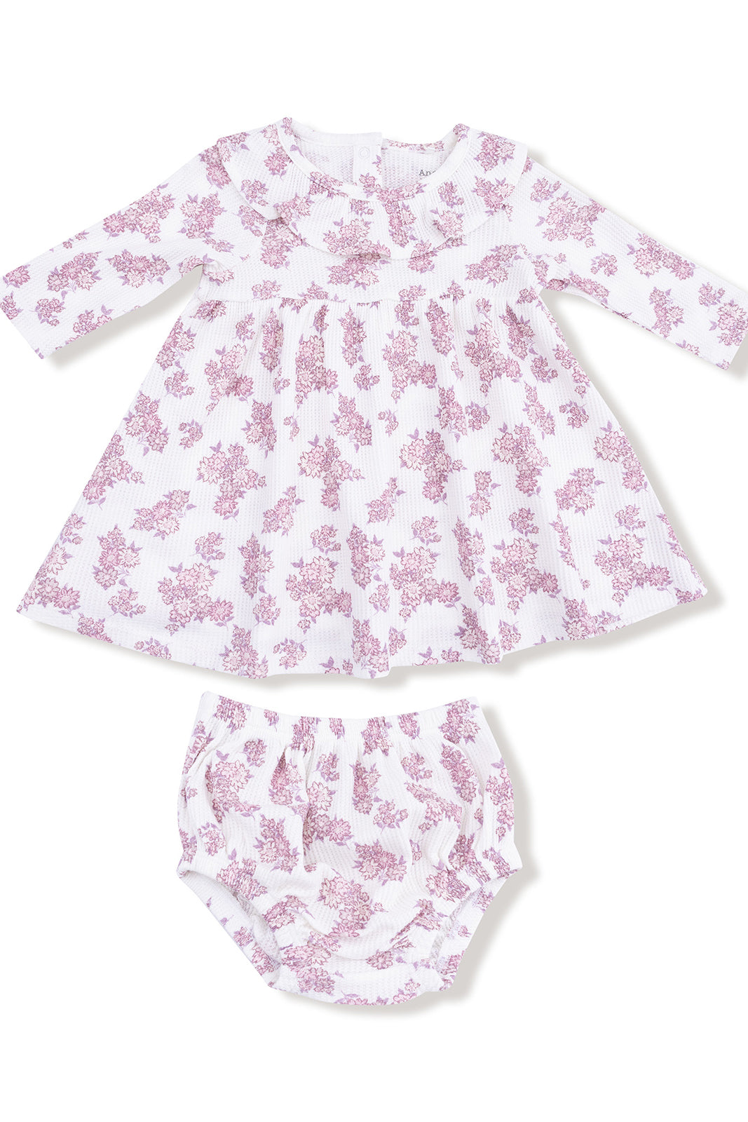 White dress with pink floral pattern and matching bloomers, designed for infants. Soft, comfortable fabric.