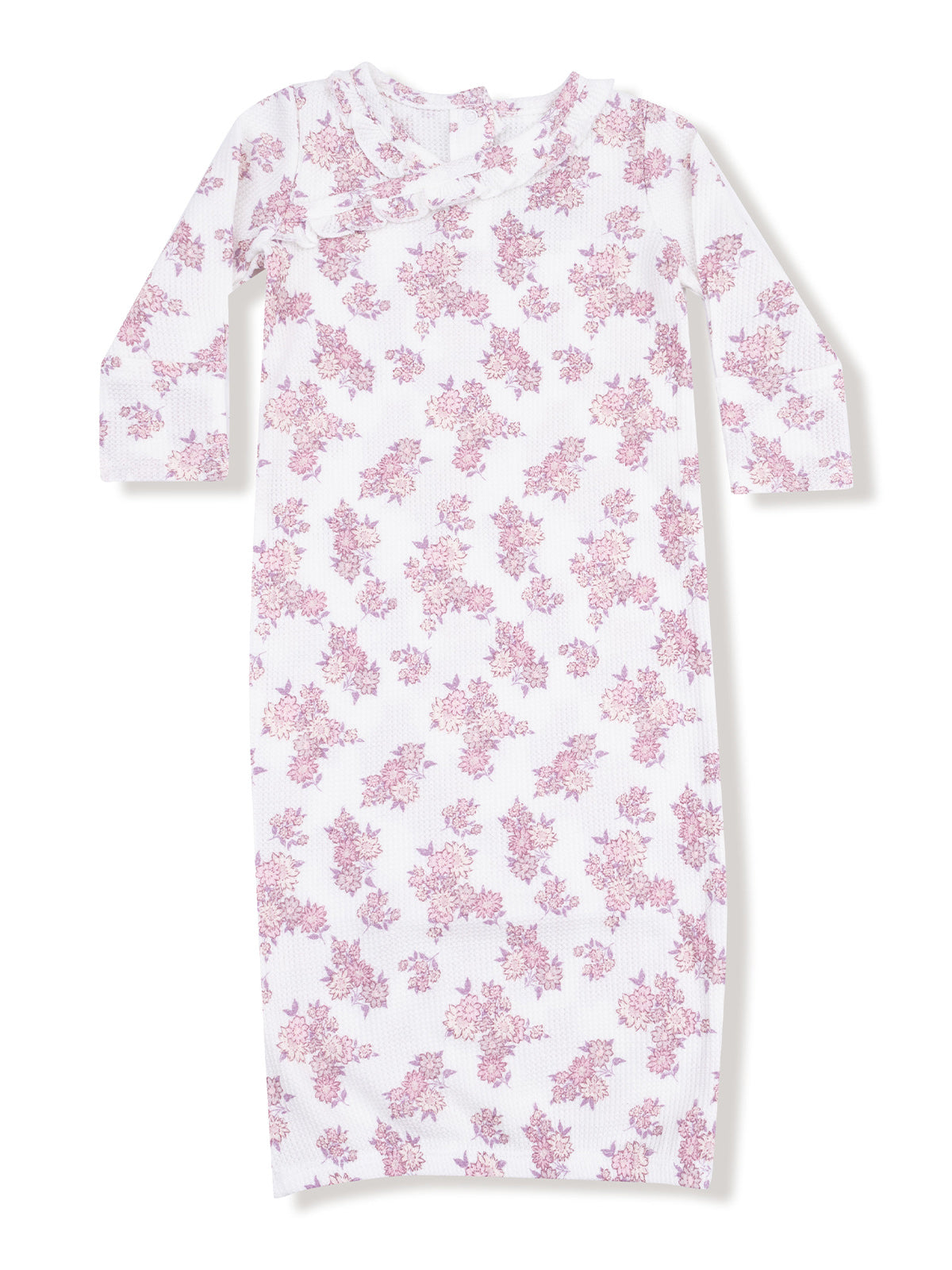 White long-sleeve dress with a pink floral pattern and a scoop neckline.
