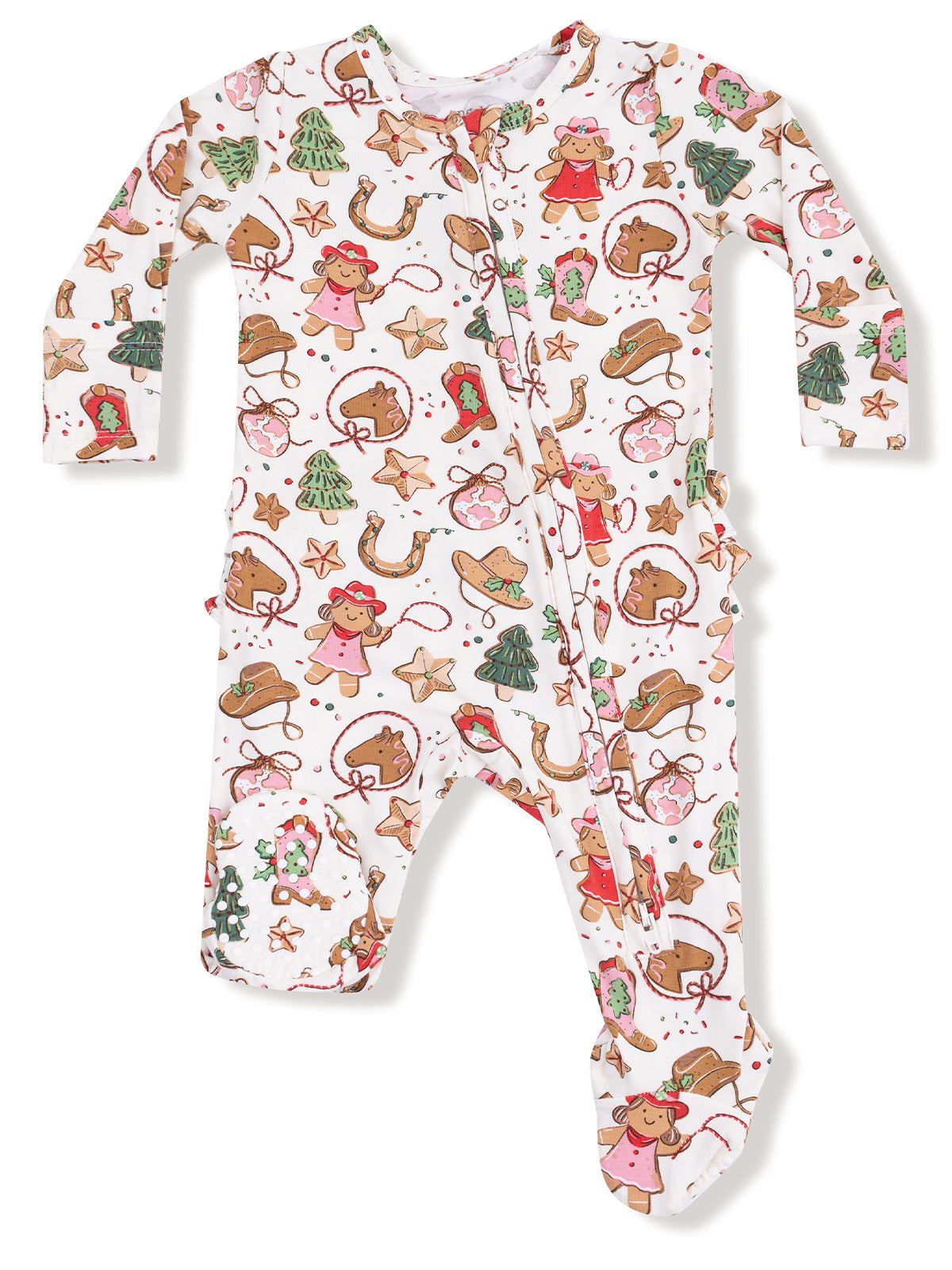 Child's festive footed pajamas featuring gingerbread men, Christmas trees, and holiday decorations in cheerful patterns.