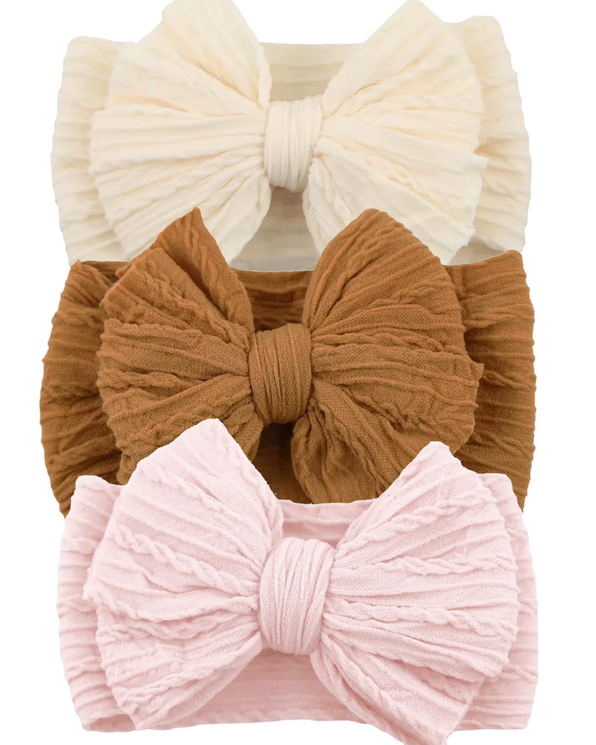 Three textured headbands in cream, brown, and pink colors, tied in large bows.