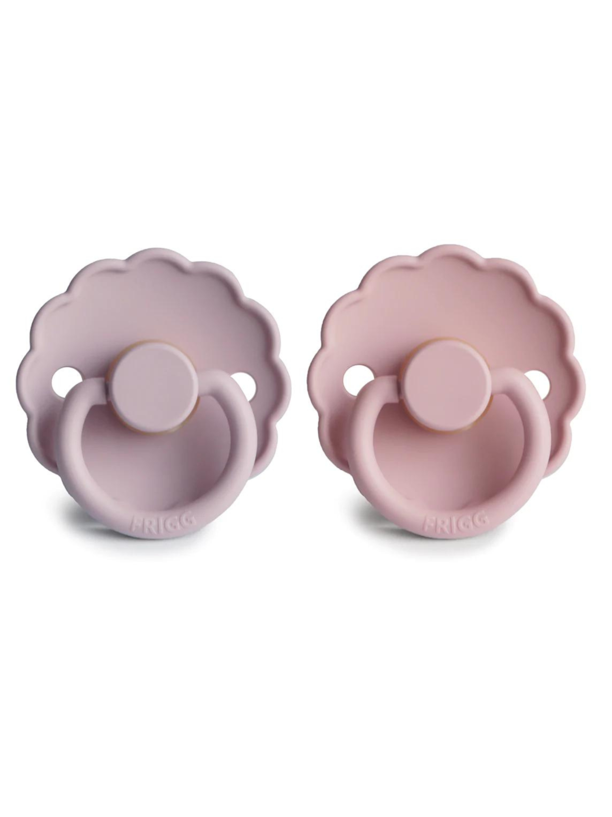 Two silicone baby pacifiers in lavender and blush pink, featuring a scalloped design and easy-grip handle.