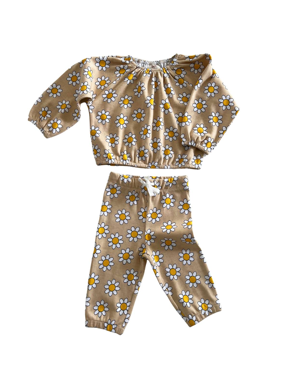 Brown floral children's outfit featuring a long-sleeve top and matching pants with yellow and white daisies.